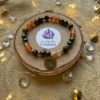 Bracelet signe astrologique Capricorne avec perles dorées et breloque astrologique