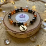 Breloque signe Capricorne sur bracelet astrologique en pierres naturelles